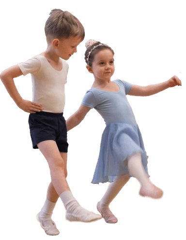 A young boy and girl in ballet attire, practicing together, with the girl in a blue dress extending her leg forward.